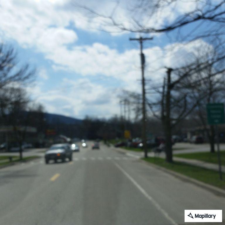 Male in motorized wheelchair tipped over at intersection