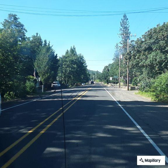 Erratic red sedan reported on Highway 62
