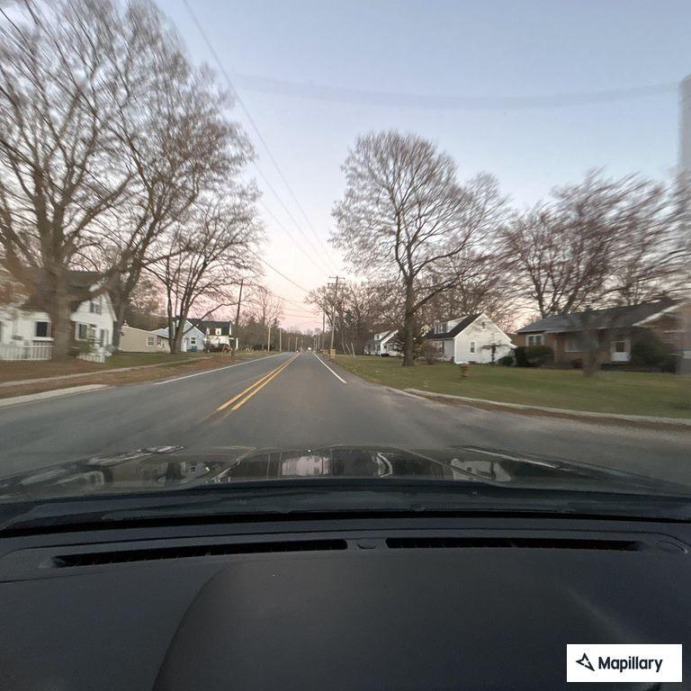 Reckless driver in red pickup nearly hits pedestrian