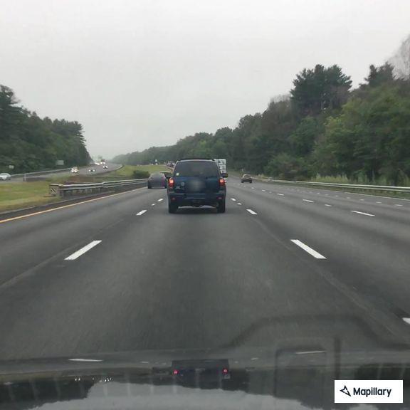 Disabled SUV on I-95 southbound ramp in Newbury