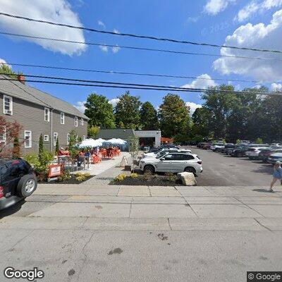 Vehicle rollover into building on Elm Street