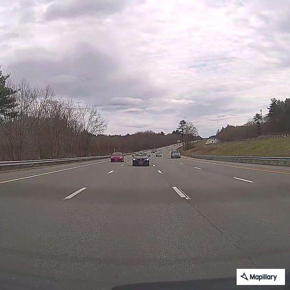 Black BMW swerving on I-93 southbound