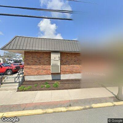 Commercial fire alarm reset by maintenance worker