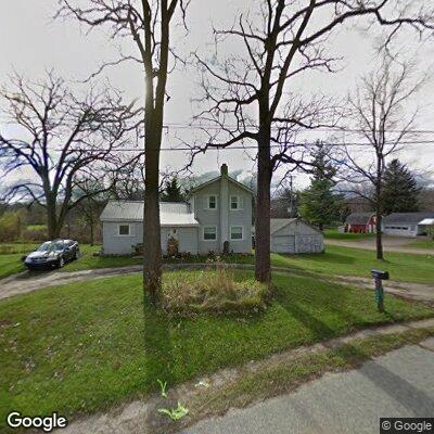 Man with large forearm laceration outside house