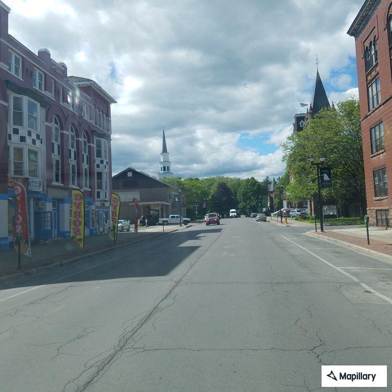 Officer checks man walking on Mary Street
