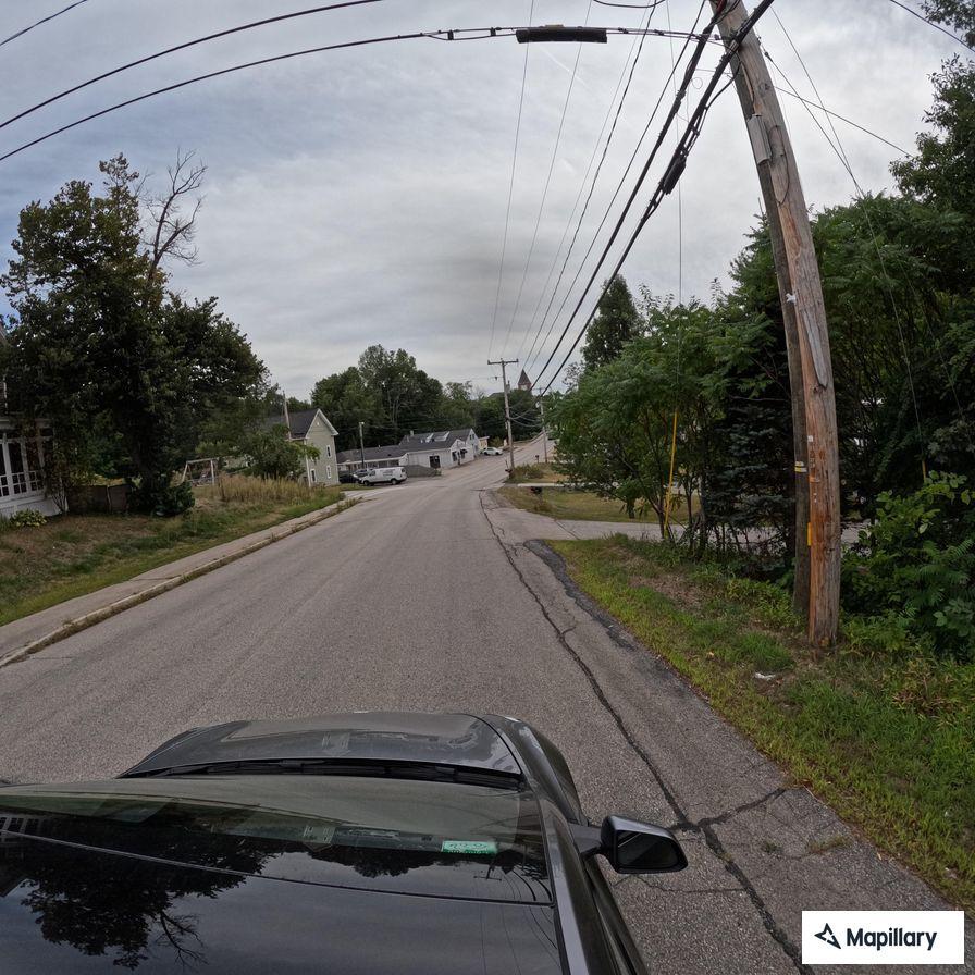 Two-car crash with oil leak at Main and High streets
