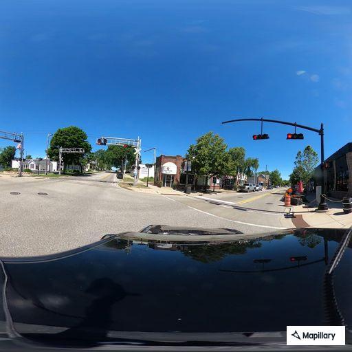 Two-vehicle crash with arm injury in Grand Haven