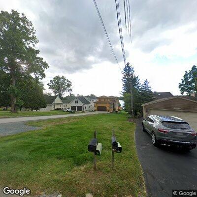 Unoccupied pickup with out-of-state plate in driveway