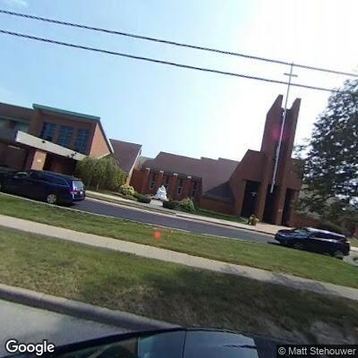 Person in cardiac arrest receiving CPR in church sanctuary