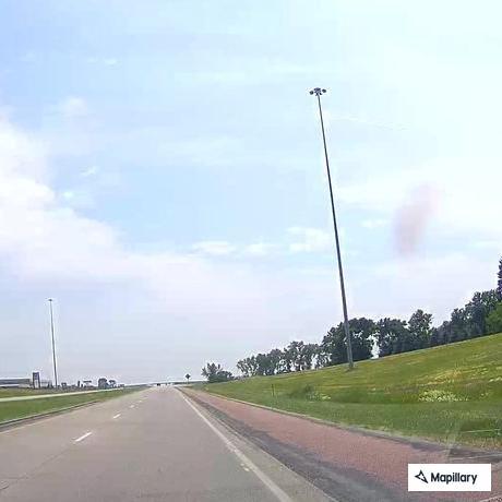 Abandoned Jeep with flat tire on I-29 near Beresford
