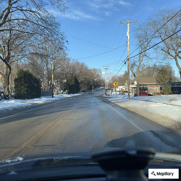 Fallen tree blocks Sherman Avenue roadway