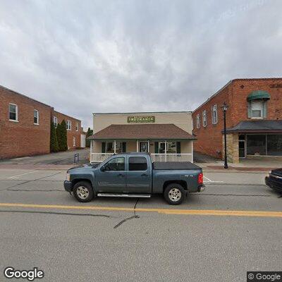 Two men fighting behind Millington Insurance