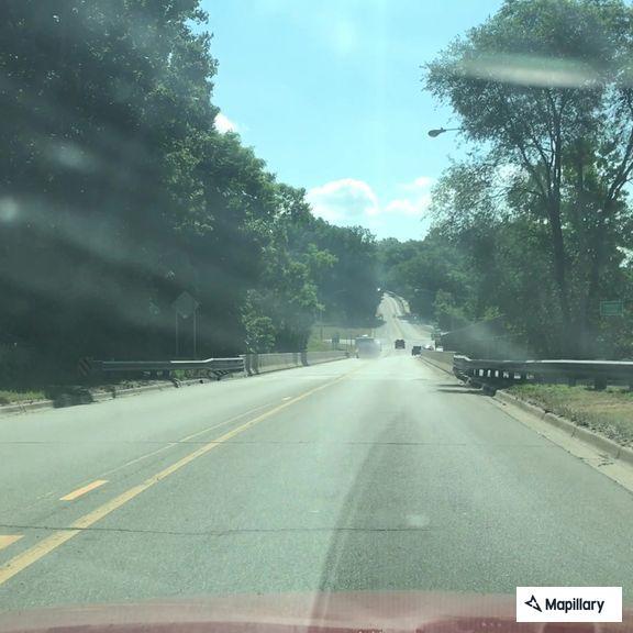 Man with mental health issues walking in traffic on Curve St