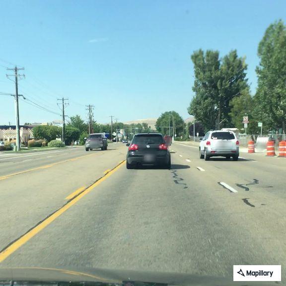 Person injured on pavement at Glenwood and Back Stretch