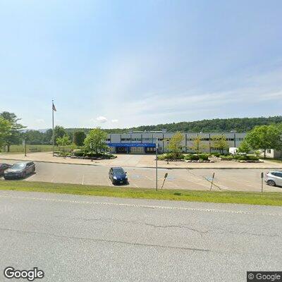 Male found lying beside vehicle at high school