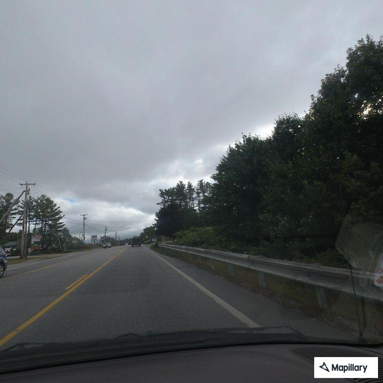 Two-car crash with coolant spill in Raymond