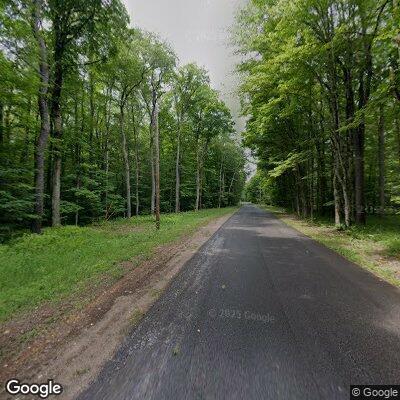 Tree down with wires sparking and fire in roadway