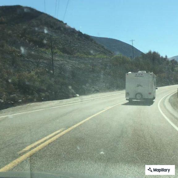 Brush fire along highway near Horseshoe Bend