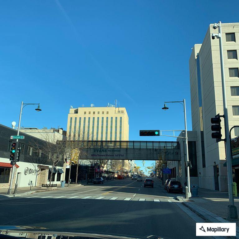 Person experiencing pain in left leg at College and Division
