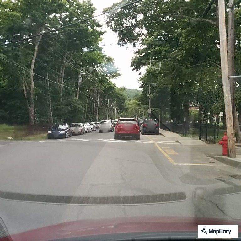 Minor crash with mirror damage at West and Holland