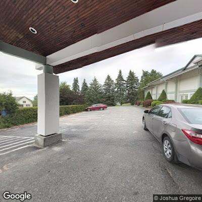Woman with back pain at Shelburne Harbor Place