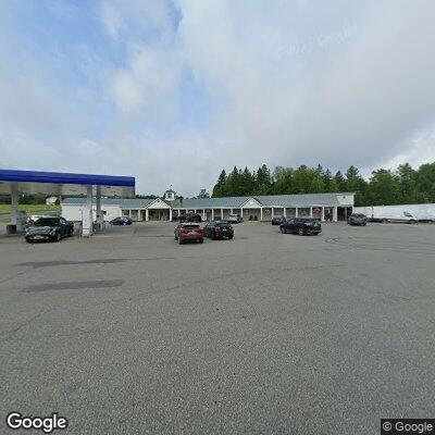 Store fire with two people unresponsive in car