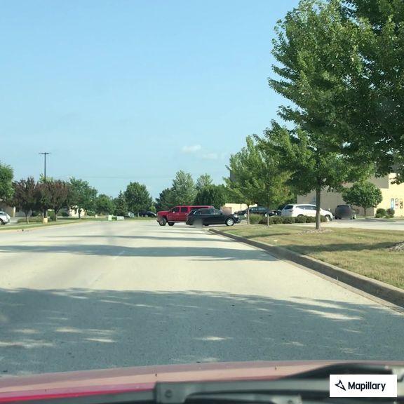 Minor two-vehicle crash in parking lot