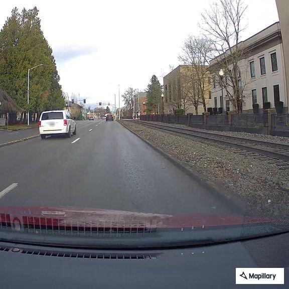 Traffic stop on white sedan at 12th and State