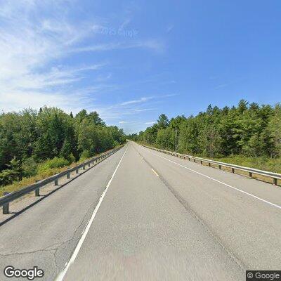 Camper driving with slideout extended on Route 9