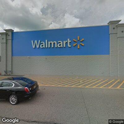 Car hits pole in Walmart lot, causing fluid leak