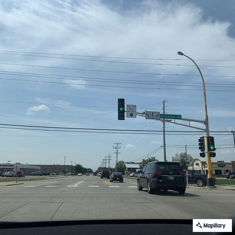 Two-vehicle crash blocking traffic, no injuries
