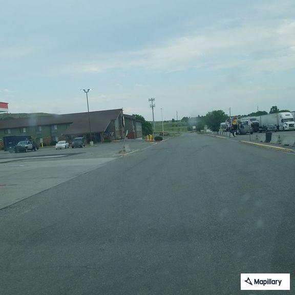 Traffic stop on red Honda Accord in parking lot