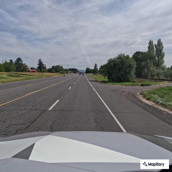Box of broken glass blocking southbound highway lanes