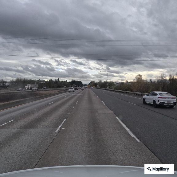 Person found lying in grass off I-5 on-ramp
