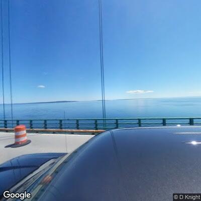 Motorcycles stopped in lane on Mackinac Bridge