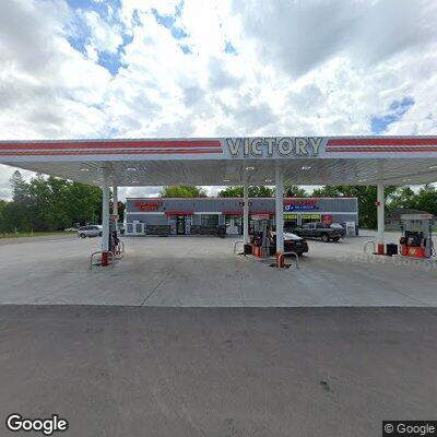 Vehicle hits parked pickup and leaves gas station