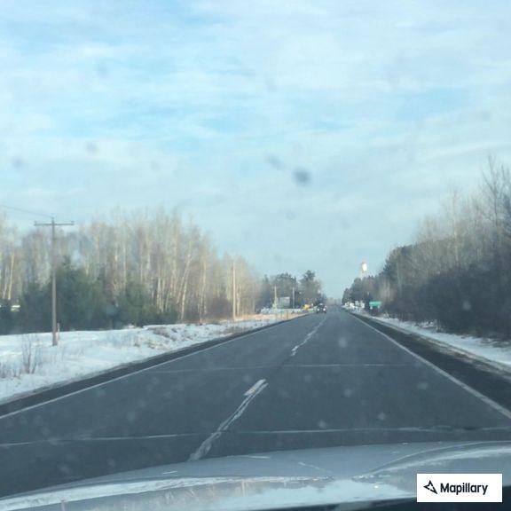 Driver crossing lane lines on Highway 73