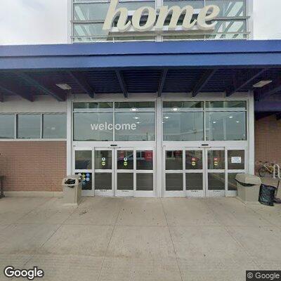 Car hits concrete barrier in store parking lot