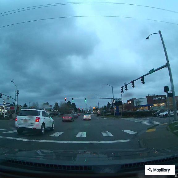 Traffic crash with broken sunroof and arm injury