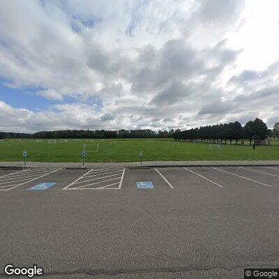 Person slumped over in vehicle at park entrance