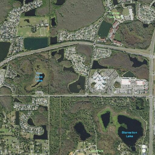 Woman transported from facility near Van Dyke Rd for abdominal pain