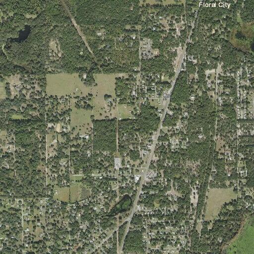 Large debris pile burning near East Round Lake Loop