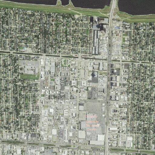 Man aged 57 in pain lying on ground at 18th St