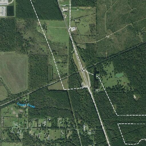 Vehicle reported in ditch on TX-321 near Water Tower Rd by Dayton
