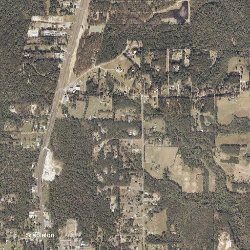 Person trapped under lawnmower near Melvin Johnson Road