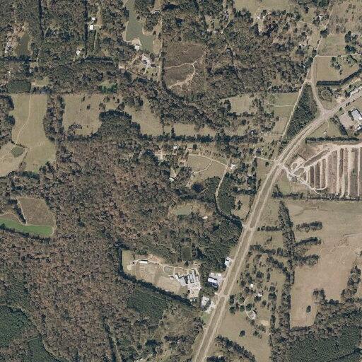 White Mercedes SUV located near Tractor Max