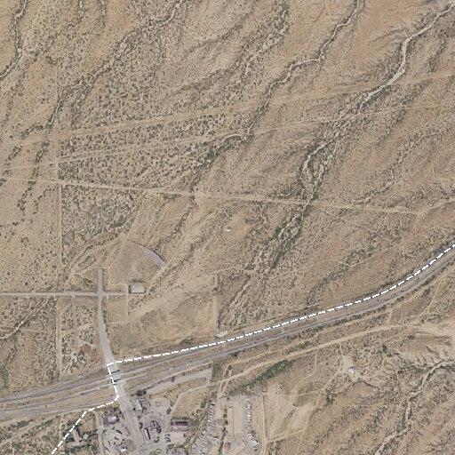 Car hits light pole and leaves debris on AZ-90