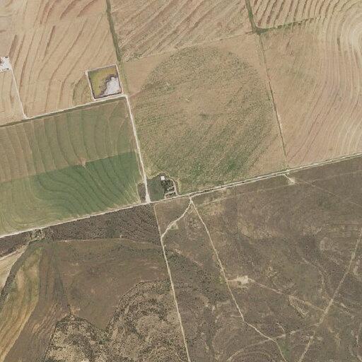 Gate blocks access to roadside grass fire