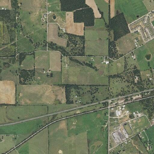 Car passing on highway shoulder near Tolar