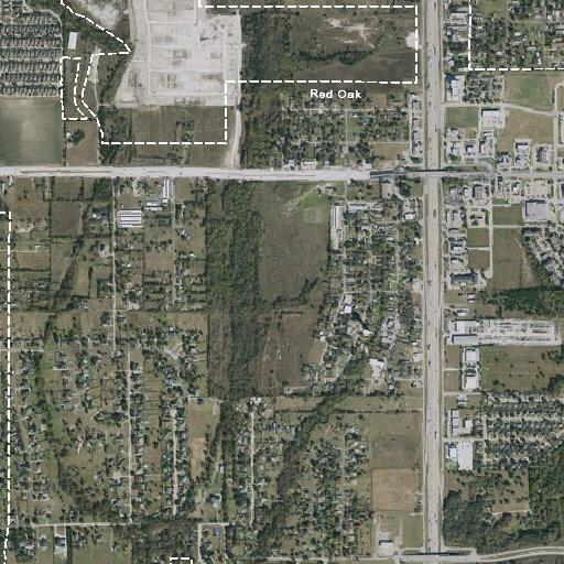 Voices and flashlight reported in wooded area